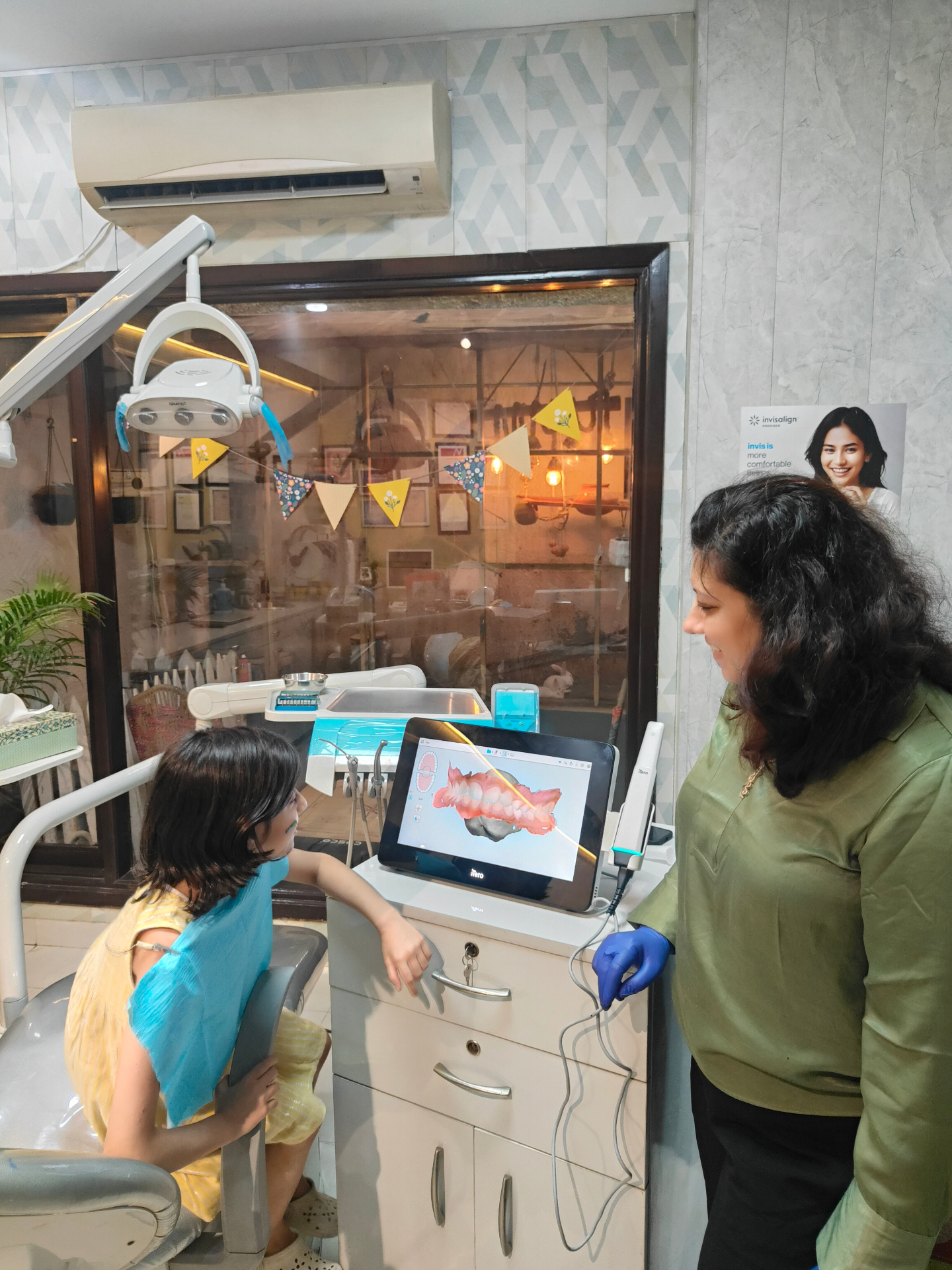 Child watching her iTero digital scan on screen