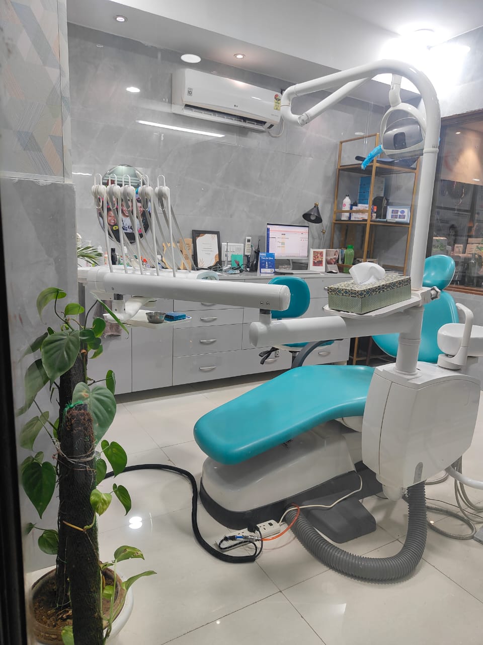 Modern dental operatory at Dental Brasstacks with digital workstation and overhead surgical light
