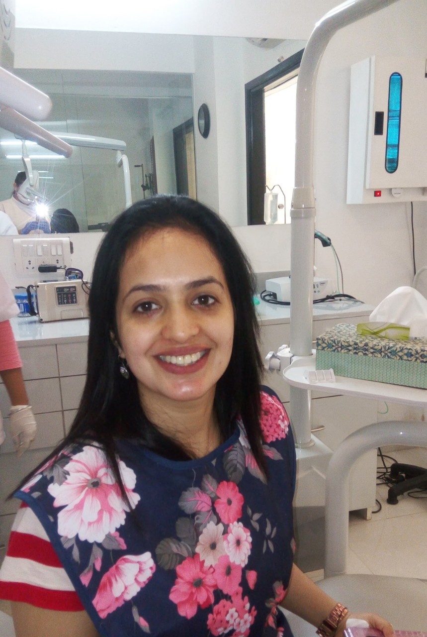 Happy Dental Brasstacks patient in the clinic chair during a visit.