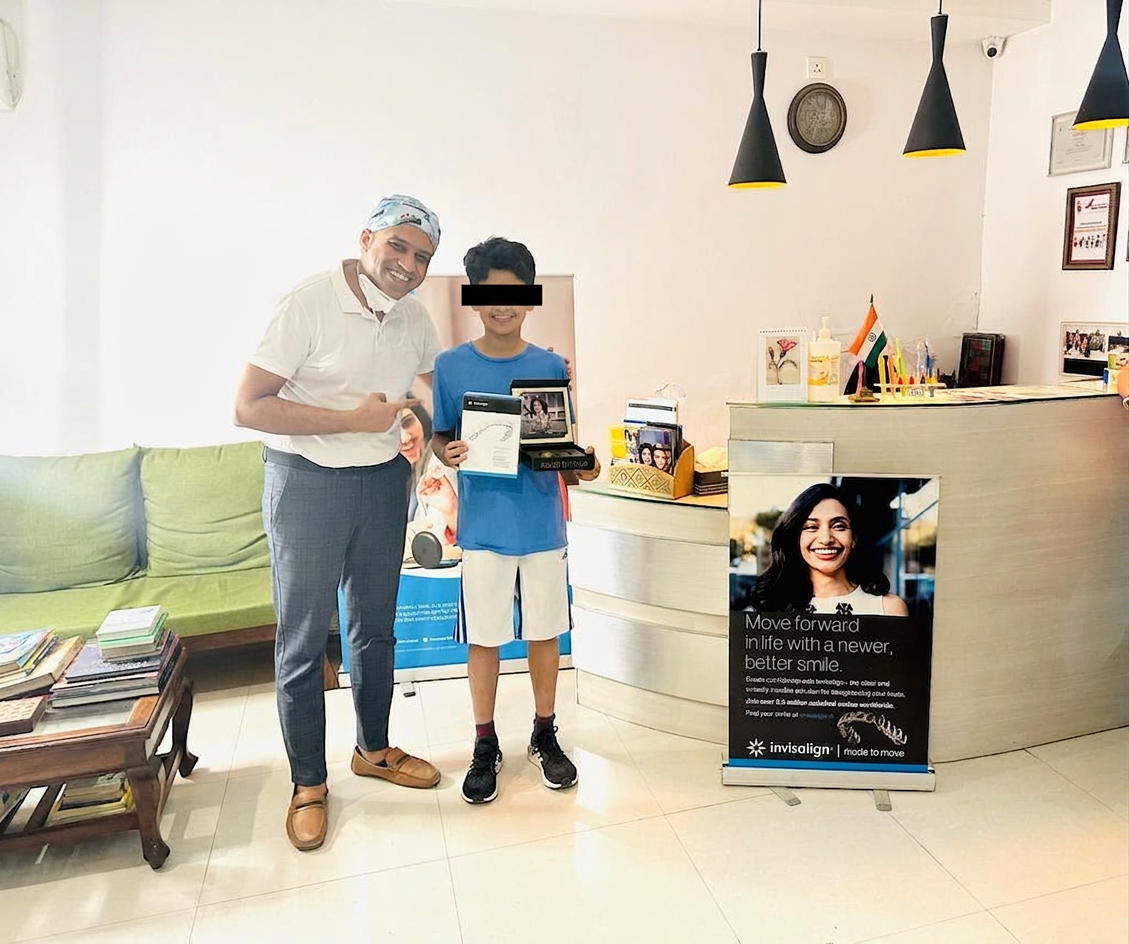 Dr. Aneesh Katyal with a young Invisalign patient at the Sohna Road clinic, beginning his Made to Move journey